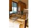 Cozy kitchen area with a large window and durable countertops at 8103 E Southern Ave # 24, Mesa, AZ 85209