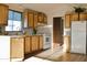 Well-lit kitchen equipped with essential appliances and generous cabinet space at 8103 E Southern Ave # 24, Mesa, AZ 85209