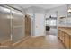 Bathroom with shower and access to the bedroom at 17156 W Lachlan Ct, Surprise, AZ 85387