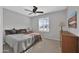 Bedroom with a queen-size bed and built in dresser at 17156 W Lachlan Ct, Surprise, AZ 85387