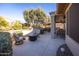 Covered patio with seating area and built-in grill at 17156 W Lachlan Ct, Surprise, AZ 85387