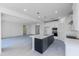 Open concept space with kitchen, living room, and dining area with hard surface flooring at 17463 N 66Th Ave, Glendale, AZ 85308