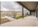 Beautiful backyard featuring a modern pool with water features, desert landscaping, and an outdoor kitchen at 12297 E Troon Vista Dr # 255, Scottsdale, AZ 85255