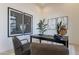 Home office featuring modern decor, light wood floors, and dual abstract art pieces at 12297 E Troon Vista Dr # 255, Scottsdale, AZ 85255