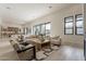 Open living space with stylish seating, a rustic coffee table, and expansive windows at 12297 E Troon Vista Dr # 255, Scottsdale, AZ 85255
