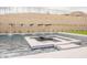 The pool has integrated water features and is surrounded by manicured landscaping at 12297 E Troon Vista Dr # 255, Scottsdale, AZ 85255
