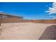 This backyard is large and is enclosed with a block wall at 18450 E Camila Dr, Gold Canyon, AZ 85118