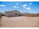 Backyard features a blank canvas with block wall and partial view of the home's exterior at 18450 E Camila Dr, Gold Canyon, AZ 85118