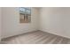 Neutral bedroom with carpeted floors and a window allowing natural light to come in at 18450 E Camila Dr, Gold Canyon, AZ 85118