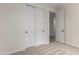 Bedroom features carpeted floors, white walls, and a closet with sliding doors at 18450 E Camila Dr, Gold Canyon, AZ 85118