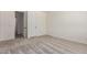 Cozy bedroom featuring plush carpet, ample natural light, and a spacious closet for storage at 18450 E Camila Dr, Gold Canyon, AZ 85118