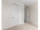 This bedroom features neutral carpeting and a closet with sliding doors at 18450 E Camila Dr, Gold Canyon, AZ 85118