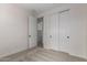 Bedroom features carpeted floors, white walls, and a closet with sliding doors at 18450 E Camila Dr, Gold Canyon, AZ 85118