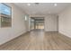 Bright living room with luxury vinyl flooring, large windows and recessed lighting providing a comfortable and inviting space at 18450 E Camila Dr, Gold Canyon, AZ 85118
