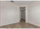 This room features wood-look floors and a doorway at 18450 E Camila Dr, Gold Canyon, AZ 85118