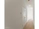 Modern hallway with light walls and wood floors at 312 E Windsor Ave # 14, Phoenix, AZ 85004