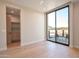 Bright bedroom with sliding glass doors leading to a patio at 28119 N 109Th Way, Scottsdale, AZ 85262