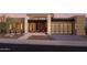 Modern home exterior with desert landscaping and three-car garage at 28119 N 109Th Way, Scottsdale, AZ 85262