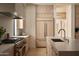 Modern kitchen features stainless steel appliances and light wood cabinets at 28119 N 109Th Way, Scottsdale, AZ 85262