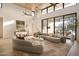 Spacious living area with large windows and access to backyard at 28119 N 109Th Way, Scottsdale, AZ 85262