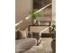 Elegant living room with curved sofa and statement art at 28119 N 109Th Way, Scottsdale, AZ 85262
