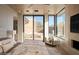 Main bedroom with patio doors opening to a pool at 28119 N 109Th Way, Scottsdale, AZ 85262