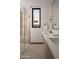 Modern bathroom with dual sinks, a large shower, and a soaking tub at 28101 N 109Th Way, Scottsdale, AZ 85262