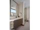 Modern bathroom with a large mirror and glass shower at 28101 N 109Th Way, Scottsdale, AZ 85262