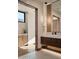 Elegant bathroom with floating vanity and modern lighting at 28101 N 109Th Way, Scottsdale, AZ 85262