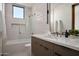 Contemporary bathroom with a built-in tub and modern vanity at 28101 N 109Th Way, Scottsdale, AZ 85262