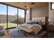 Bright bedroom with large window and backyard view at 28101 N 109Th Way, Scottsdale, AZ 85262