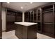 Large walk-in closet with ample shelving and drawers at 28101 N 109Th Way, Scottsdale, AZ 85262