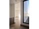 Light-filled hallway with wood flooring and modern finishes at 28101 N 109Th Way, Scottsdale, AZ 85262