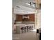 Spacious kitchen with marble countertops, modern cabinetry, and breakfast bar at 28101 N 109Th Way, Scottsdale, AZ 85262