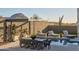 Relaxing pool area with patio furniture and mountain views at 28101 N 109Th Way, Scottsdale, AZ 85262