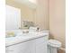 Cozy bathroom with white vanity, neutral walls, and modern fixtures at 9143 W Harmony Ln, Peoria, AZ 85382