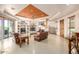 Spacious living room with stone fireplace, built-in shelving, and leather furniture at 30711 N 162Nd St, Scottsdale, AZ 85262