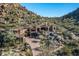 Luxury estate home nestled in the mountains with a long driveway at 26761 N 98Th Way, Scottsdale, AZ 85262