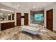 Large bathroom with soaking tub, walk-in shower, and double vanity at 26761 N 98Th Way, Scottsdale, AZ 85262
