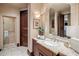 Elegant bathroom with tiled floors and a walk-in shower at 26761 N 98Th Way, Scottsdale, AZ 85262