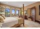 Spacious bedroom with large windows and mountain views at 26761 N 98Th Way, Scottsdale, AZ 85262