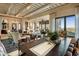 Bright dining room features a large table and access to the living area at 26761 N 98Th Way, Scottsdale, AZ 85262
