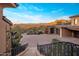 Long driveway leading to a luxurious home with scenic views at 26761 N 98Th Way, Scottsdale, AZ 85262