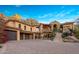 Stunning luxury home with a large driveway and mountain views at 26761 N 98Th Way, Scottsdale, AZ 85262