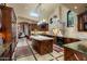 Gourmet kitchen boasts a large island, custom cabinetry, and high-end appliances at 26761 N 98Th Way, Scottsdale, AZ 85262