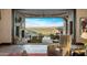 Living area with sliding doors opening to a patio and mountain views at 26761 N 98Th Way, Scottsdale, AZ 85262