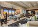 Open living room with expansive windows and luxurious furnishings at 26761 N 98Th Way, Scottsdale, AZ 85262