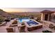 Luxury pool and spa with mountain views and outdoor seating at 26761 N 98Th Way, Scottsdale, AZ 85262