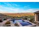Stunning infinity pool with a spa and breathtaking mountain views at 26761 N 98Th Way, Scottsdale, AZ 85262