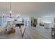 Open dining area with kitchen and living room views at 17407 N 130Th Dr, Sun City West, AZ 85375